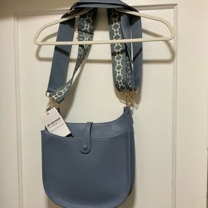 - Adhorned Messenger Bag with two straps